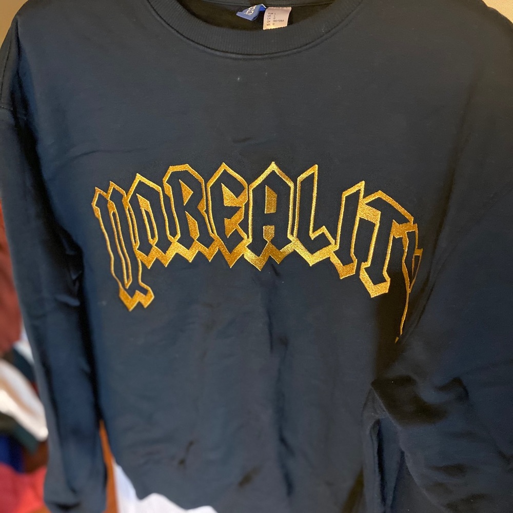 H&M sweatshirt “No Reality”